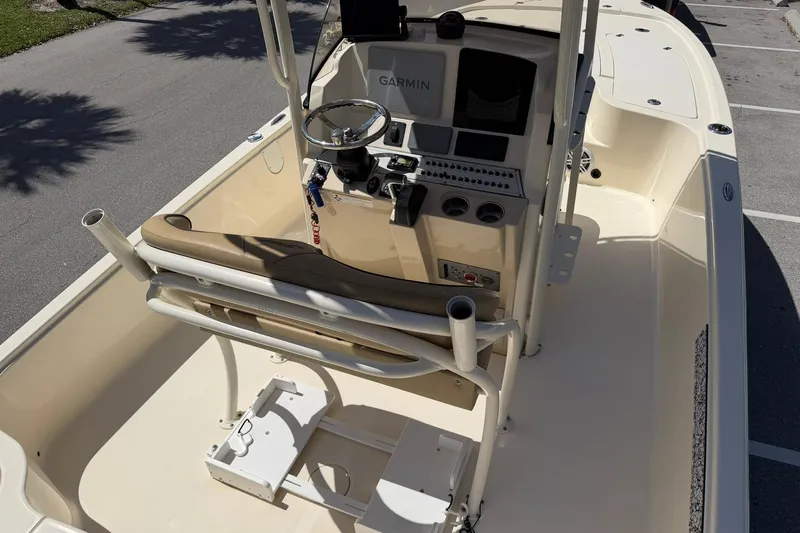 Slide: The Image of 2018 Scout 231 XS boat interior with Garmin navigation system and steering console. - 12
