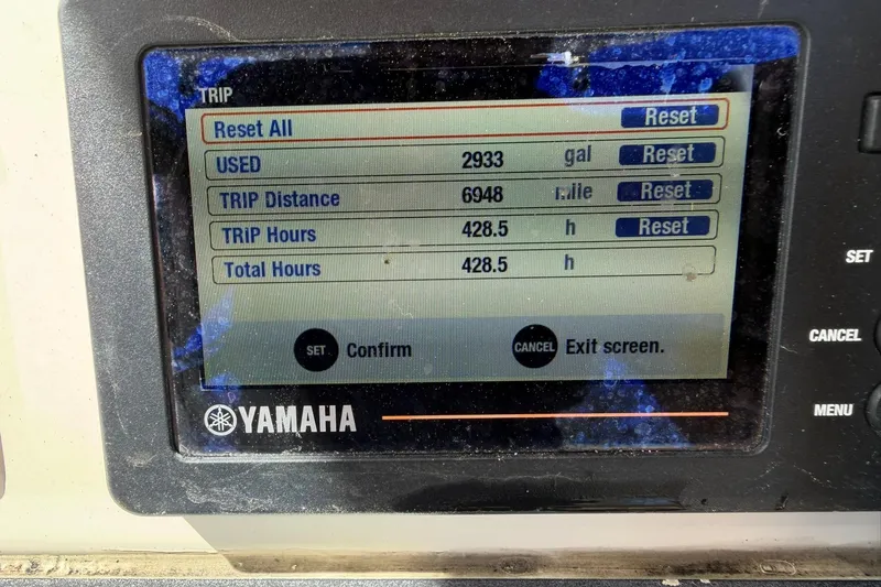 Slide: The Image of Yamaha display showing trip data: 2933 gallons used, 6948 miles, 428.5 hours on Scout 231 XS. - 15