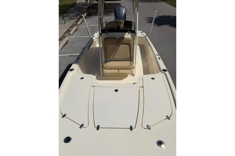 Slide: The Image of 2018 Scout 231 XS boat interior with seating and storage compartments. - 22