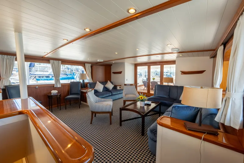 Slide: The Image of Luxurious 1969 Custom Hargrave yacht interior with elegant seating and nautical decor. - 2