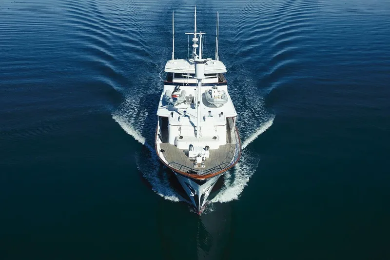 Slide: The Image of Aerial view of 1969 Custom Hargrave yacht cruising on calm blue waters. - 35
