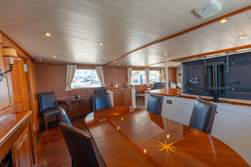 Slide: The Image of Luxurious 1969 Custom Hargrave yacht interior with elegant wood finishes and modern amenities. - 7