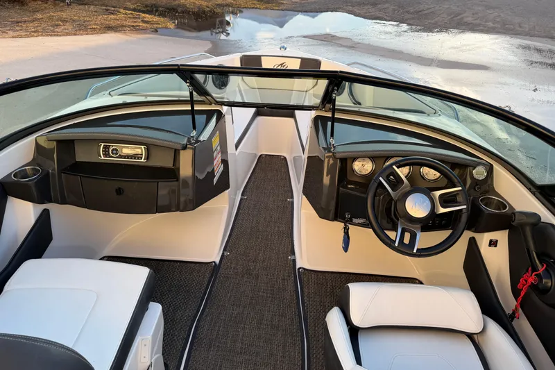 Slide: The Image of 2017 Monterey 196FS boat interior with steering wheel and dashboard controls. - 14