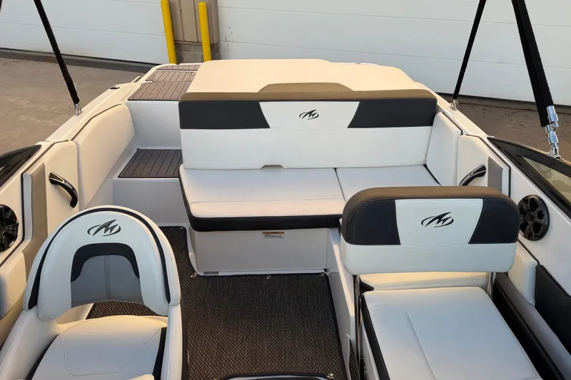 Slide: The Image of 2017 Monterey 196FS boat interior with white and black seating, modern design. - 17