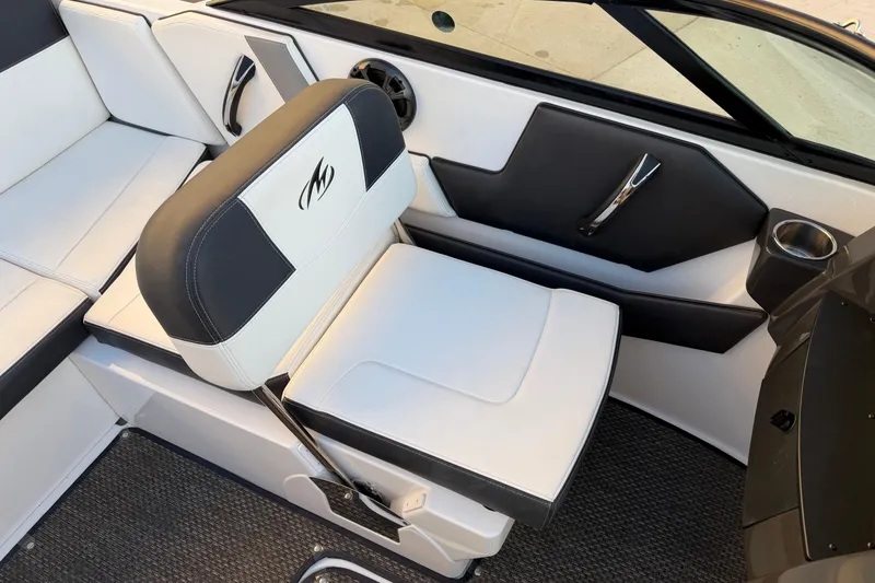 Slide: The Image of 2017 Monterey 196FS boat interior with black and white seating and modern design. - 21