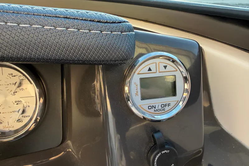 Slide: The Image of Control panel of a 2017 Monterey 196FS boat with gauges and digital display. - 41