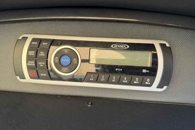 Slide: The Image of Jensen MS2A stereo system in a 2017 Monterey 196FS boat dashboard. - 43