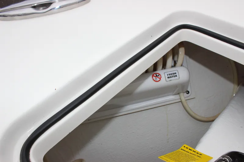 Slide: The Image of Fresh water system on 2022 Cobia 280 Center Console boat. - 43