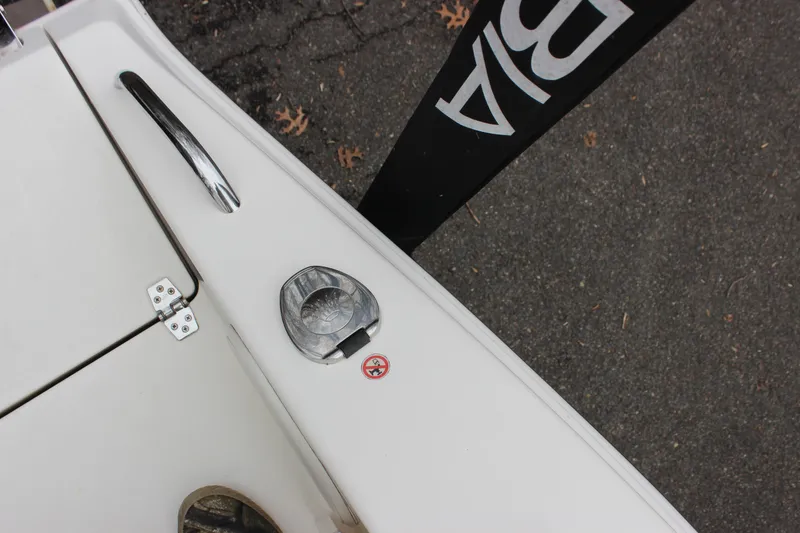 Slide: The Image of 2022 Cobia 280 Center Console boat deck with cleat and fuel cap. - 66