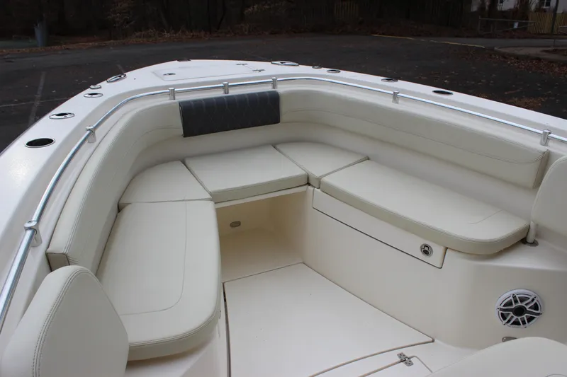 Slide: The Image of 2022 Cobia 280 Center Console boat with spacious seating and sleek design. - 67