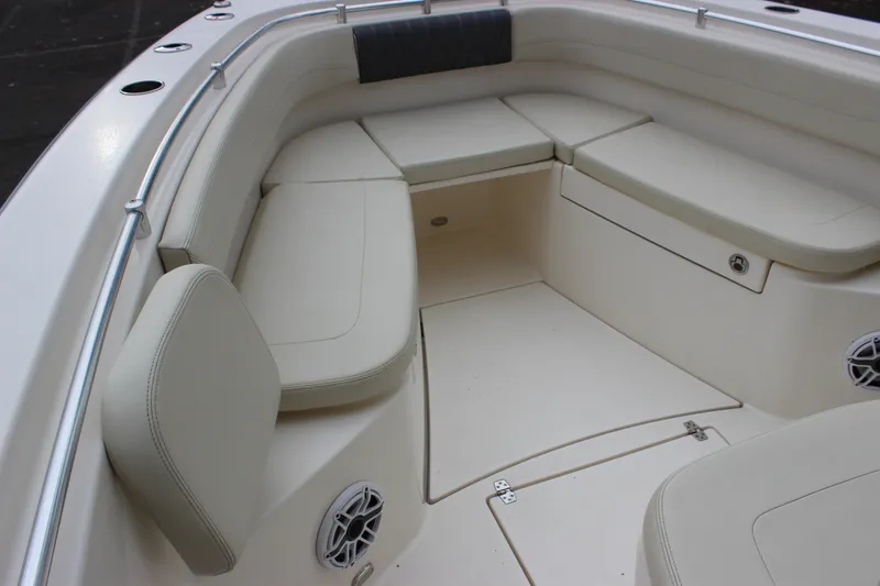 Slide: The Image of 2022 Cobia 280 Center Console boat with spacious seating and sleek design. - 68