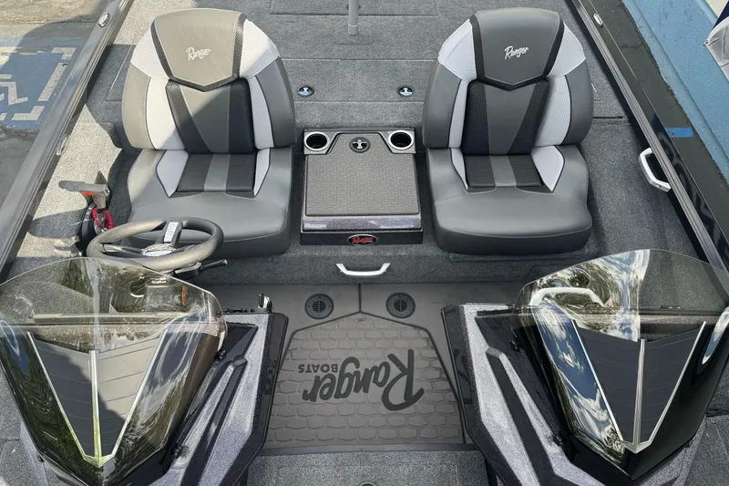 Slide: The Image of Interior of 2026 Ranger ALPHA 208 boat with dual seats and steering console. - 81