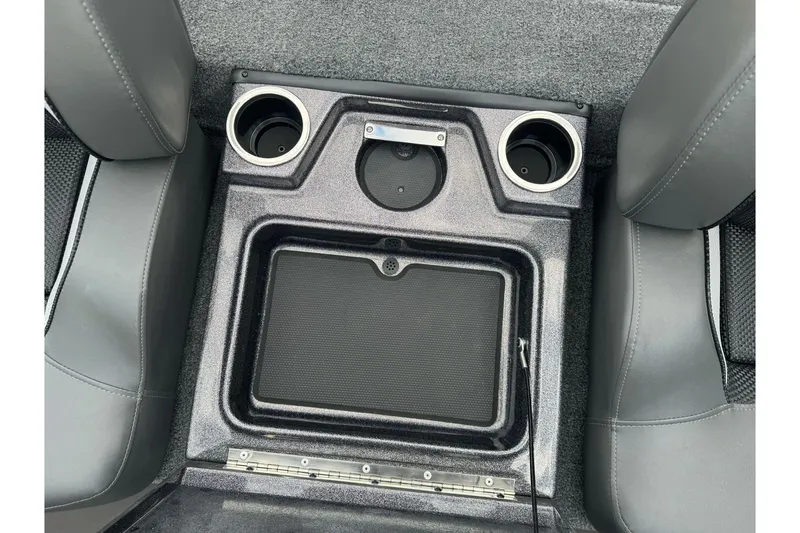 Slide: The Image of Center console of 2026 Ranger ALPHA 208 with cup holders and storage compartment. - 82