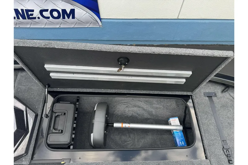 Slide: The Image of Storage compartment of 2026 Ranger ALPHA 208 boat, featuring organized equipment and accessories. - 84