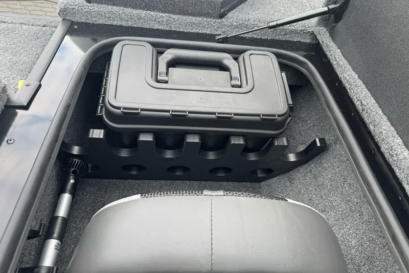 Slide: The Image of Storage compartment in 2026 Ranger ALPHA 208 boat, featuring a secure black case. - 85