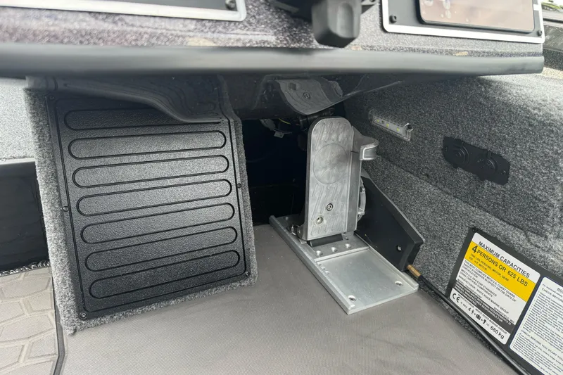 Slide: The Image of Interior view of 2026 Ranger ALPHA 208 boat, featuring foot pedal and control panel. - 88