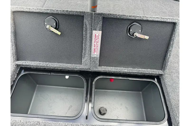 Slide: The Image of Interior storage compartments of 2026 Ranger ALPHA 208 boat, featuring secure latches. - 93