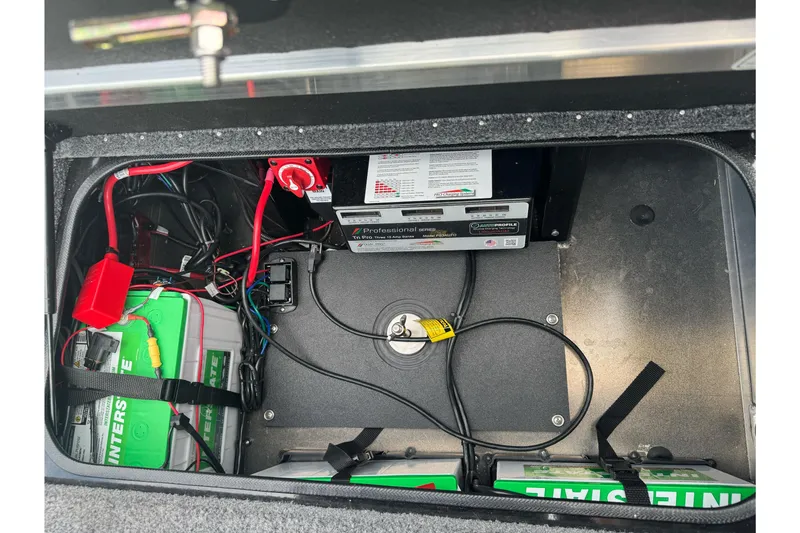 Slide: The Image of Battery compartment of 2026 Ranger ALPHA 208 with wiring and power management system. - 96