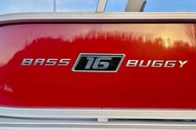 Slide: The Image of 2026 Sun Tracker Bass Buggy 16 XL Select logo on red background. - 110