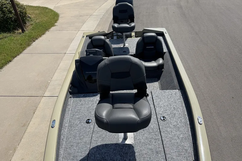 Slide: The Image of 2026 Tracker Pro Team 175 boat with gray seating and carpeted deck. - 15