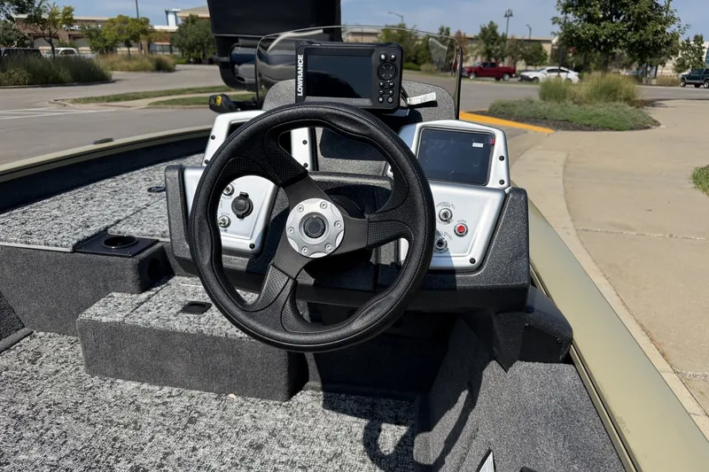 Slide: The Image of Steering console of 2026 Tracker Pro Team 175 boat with navigation equipment. - 19