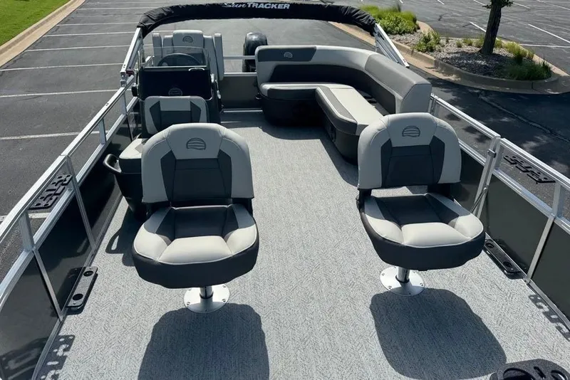 Slide: The Image of 2026 Sun Tracker Bass Buggy 16 XL Select pontoon boat with spacious seating and modern design. - 3