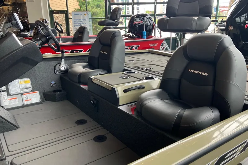 Slide: The Image of 2026 Tracker Savage 215 boat interior with comfortable seating and modern controls. - 6