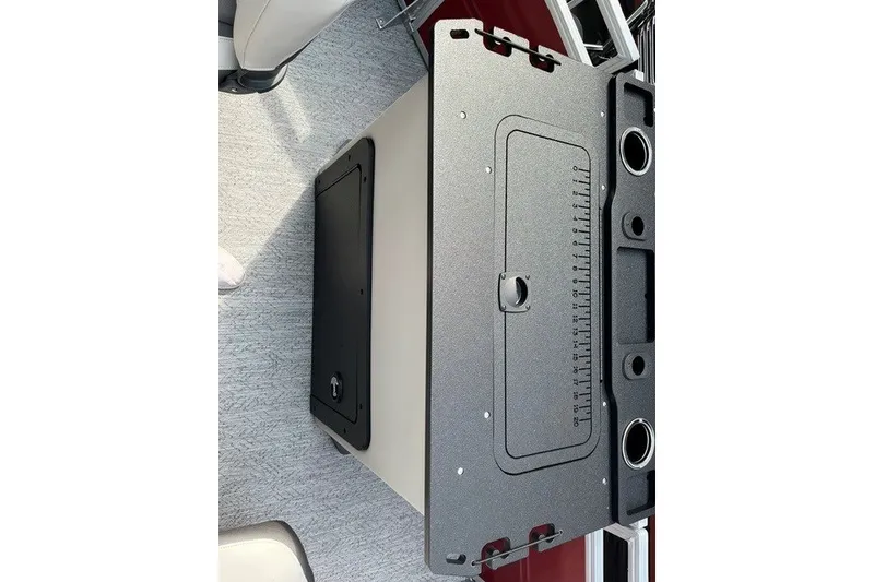 Slide: The Image of 2026 Sun Tracker Fishin' Barge 22 DLX fishing station with storage and cup holders. - 18