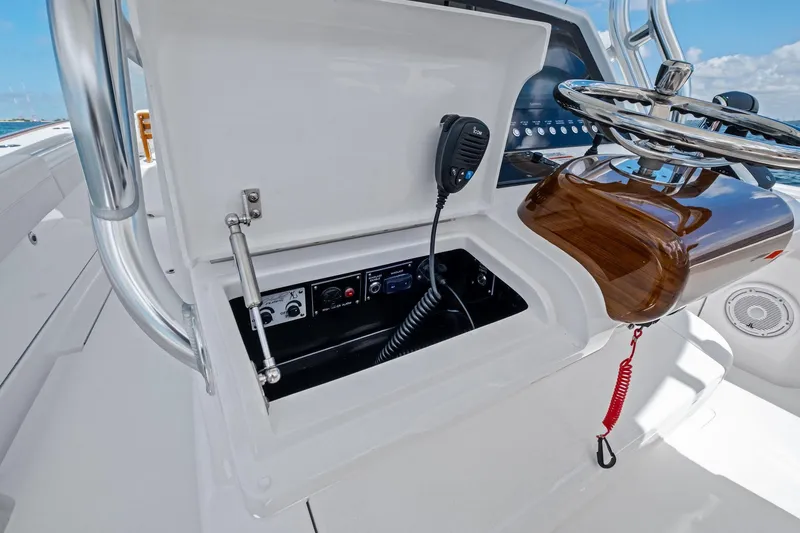 Slide: The Image of 2026 Valhalla Boatworks V-37 helm with open console and communication equipment. - 30