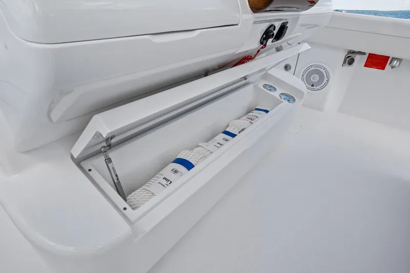 Slide: The Image of 2026 Valhalla Boatworks V-37 storage compartment with neatly organized marine rope. - 35