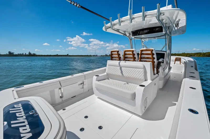 Slide: The Image of 2026 Valhalla Boatworks V-37 on calm water, featuring sleek design and comfortable seating. - 51
