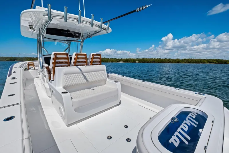 Slide: The Image of 2026 Valhalla Boatworks V-37 on water, featuring sleek design and comfortable seating. - 56