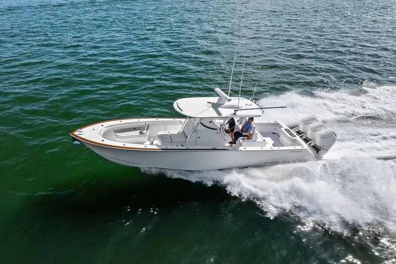 Slide: The Image of 2026 Valhalla Boatworks V-37 cruising on open water, showcasing sleek design and powerful engines. - 64