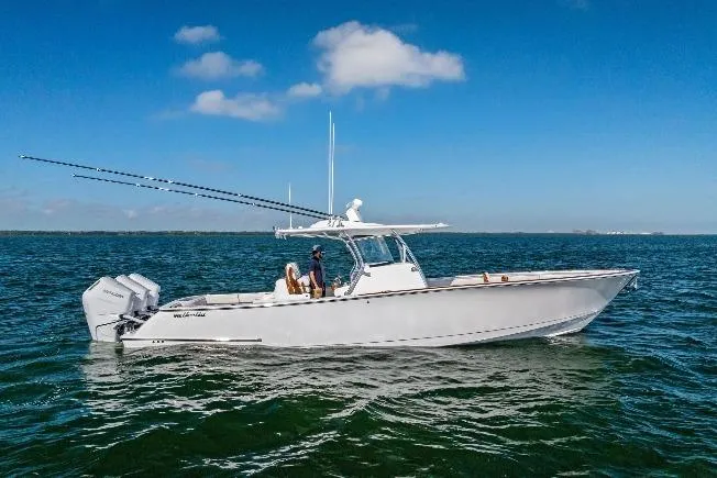 Slide: The Image of 2026 Valhalla Boatworks V-37 cruising on open water under clear blue skies. - 65