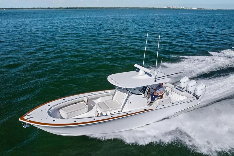 Slide: The Image of 2026 Valhalla Boatworks V-37 cruising on open water, showcasing sleek design and powerful engines. - 66