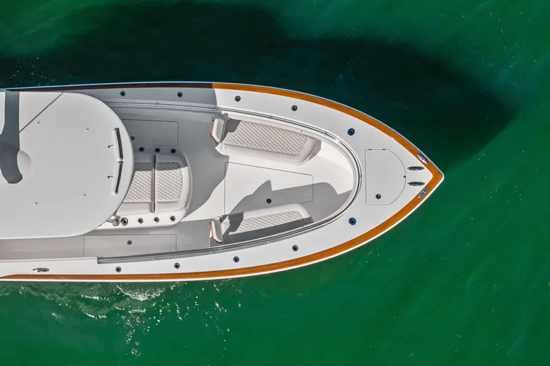 Slide: The Image of Top view of 2026 Valhalla Boatworks V-37 on clear green water. - 67