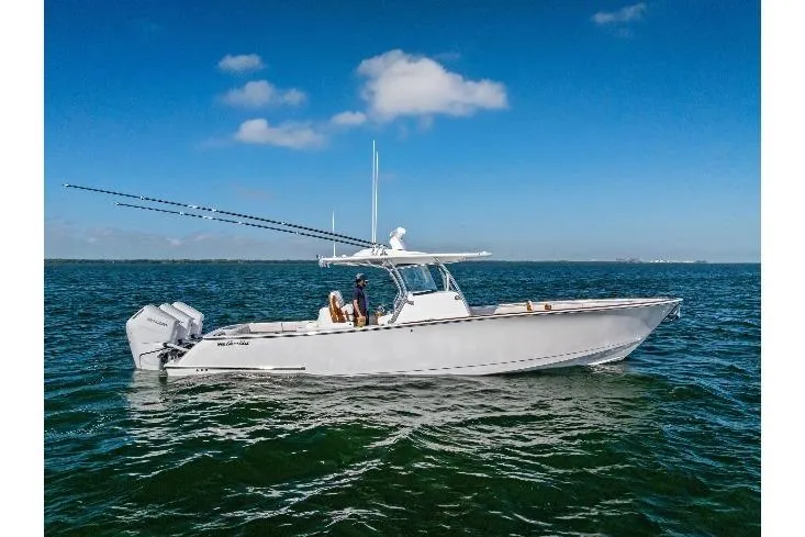 Slide: The Image of 2026 Valhalla Boatworks V-37 cruising on open water under clear blue skies. - 69