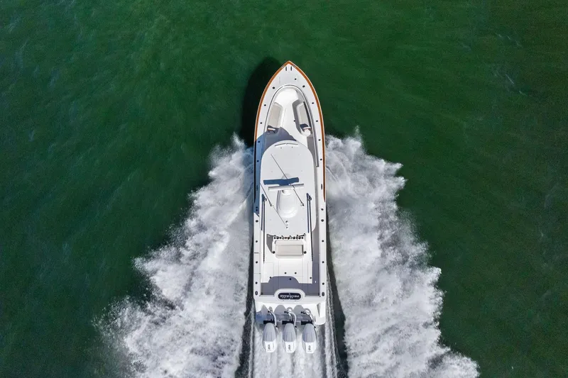 Slide: The Image of Aerial view of 2026 Valhalla Boatworks V-37 speeding on open water. - 71