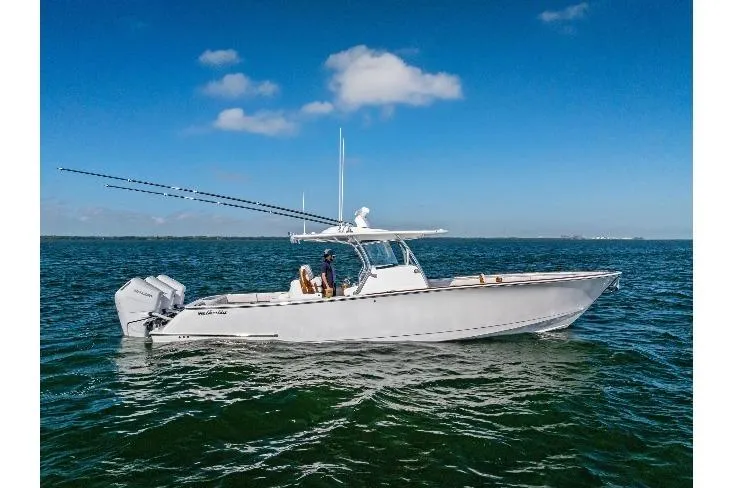Slide: The Image of 2026 Valhalla Boatworks V-37 cruising on open water under clear blue skies. - 75