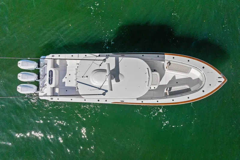 Slide: The Image of Aerial view of 2026 Valhalla Boatworks V-37 on green water. - 78
