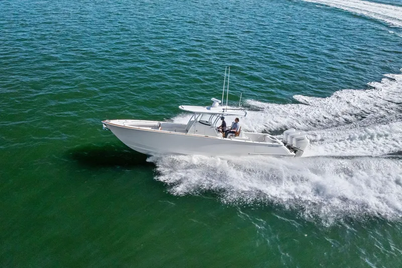 Slide: The Image of 2026 Valhalla Boatworks V-37 cruising on open water, showcasing sleek design and performance. - 79