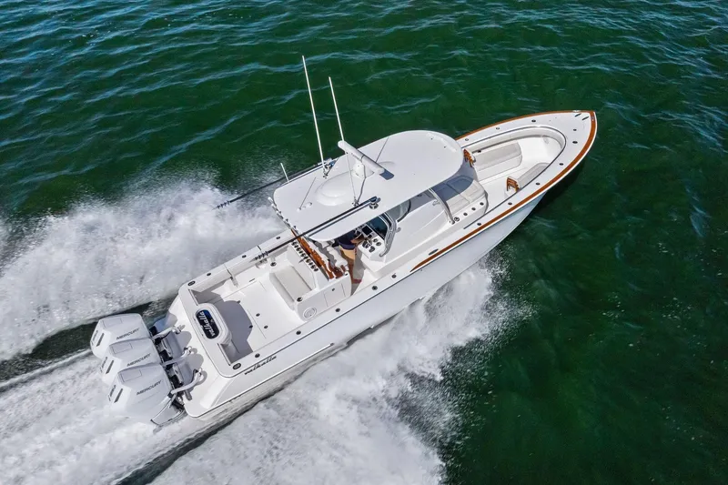 Slide: The Image of 2026 Valhalla Boatworks V-37 cruising on open water, aerial view. - 80
