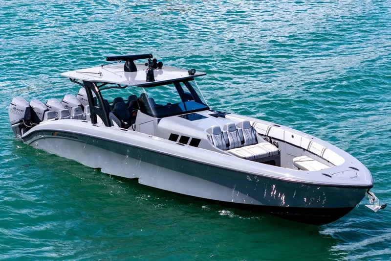 Slide: The Image of 2023 Midnight Express 43 Solstice boat cruising on clear blue water. - 11