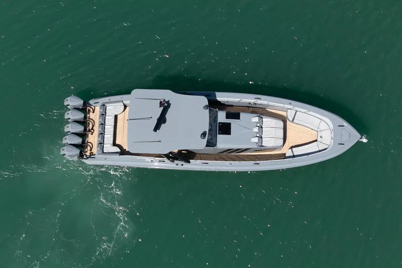 Slide: The Image of Aerial view of 2023 Midnight Express 43 Solstice luxury boat on water. - 13