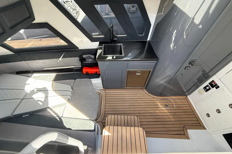 Slide: The Image of Luxurious interior of 2023 Midnight Express 43 Solstice boat with modern amenities. - 30