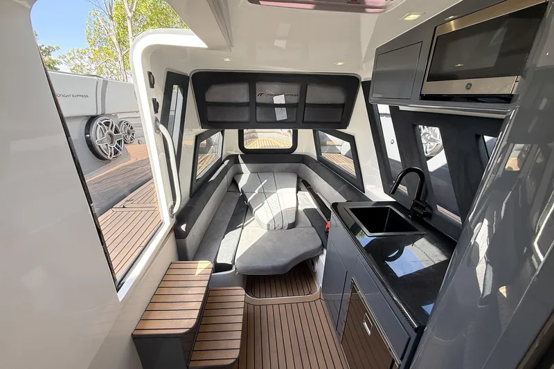Slide: The Image of Luxurious interior of 2023 Midnight Express 43 Solstice yacht with modern kitchen and seating area. - 37