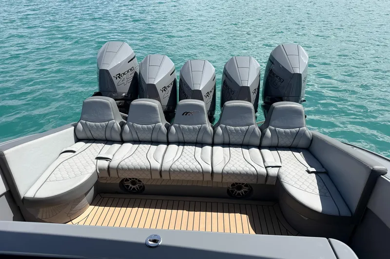Slide: The Image of Luxury seating and powerful engines on 2023 Midnight Express 43 Solstice boat. - 45
