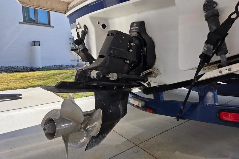 Slide: The Image of 2005 Formula 260 Sun Sport boat with Mercury outboard motor on trailer. - 12