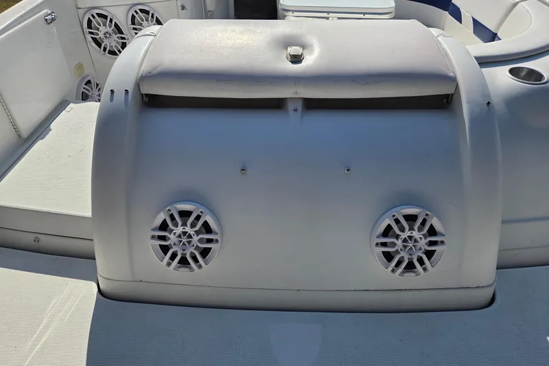 Slide: The Image of 2005 Formula 260 Sun Sport boat interior with speakers and seating. - 21
