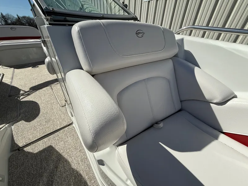 Slide: The Image of Interior of a 2012 Crownline 252 EX boat with beige upholstery. - 15